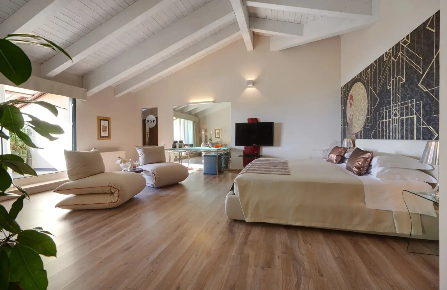 Suite mansardata con salotto